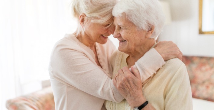 Mother and daughter embrace